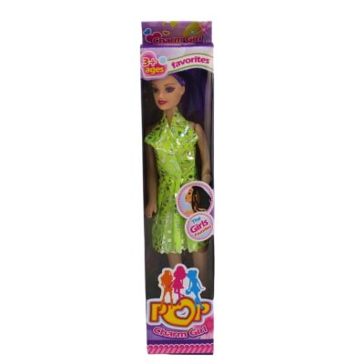 Puppe mit Kleid in Sichtbox - im Display